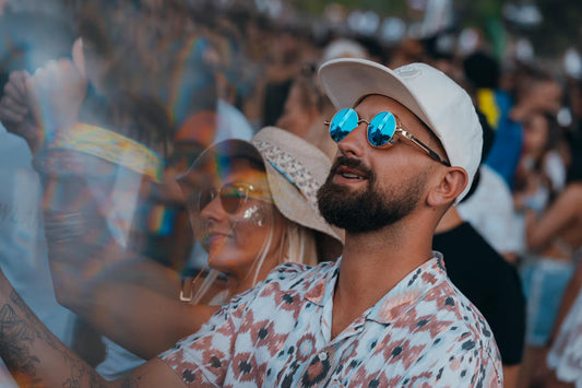 Tomorrowland picture showcasing a man wearing sunglasses.