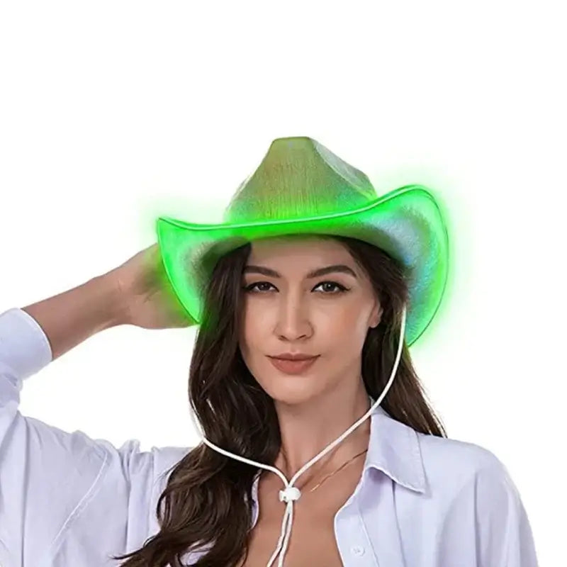 Woman wearing glowing green LED festival hat, perfect for EDM and techno events. Essential festival accessory.