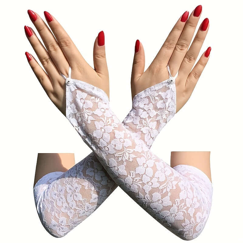 Elegant floral lace fingerless gloves in white tulle mesh worn by model, showcasing sophisticated arm warmer design with red nails.