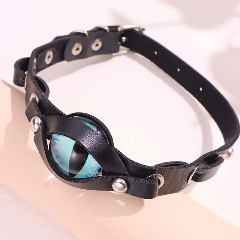 Y2K eye-shaped choker necklace with black PU leather and blue eye pendant, trendy punk statement accessory for all genders.