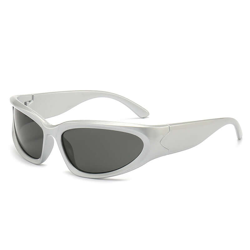 Vintage Y2K futuristic fashion sunglasses with silver polycarbonate frame and dark AC lenses, perfect for raves and festivals.