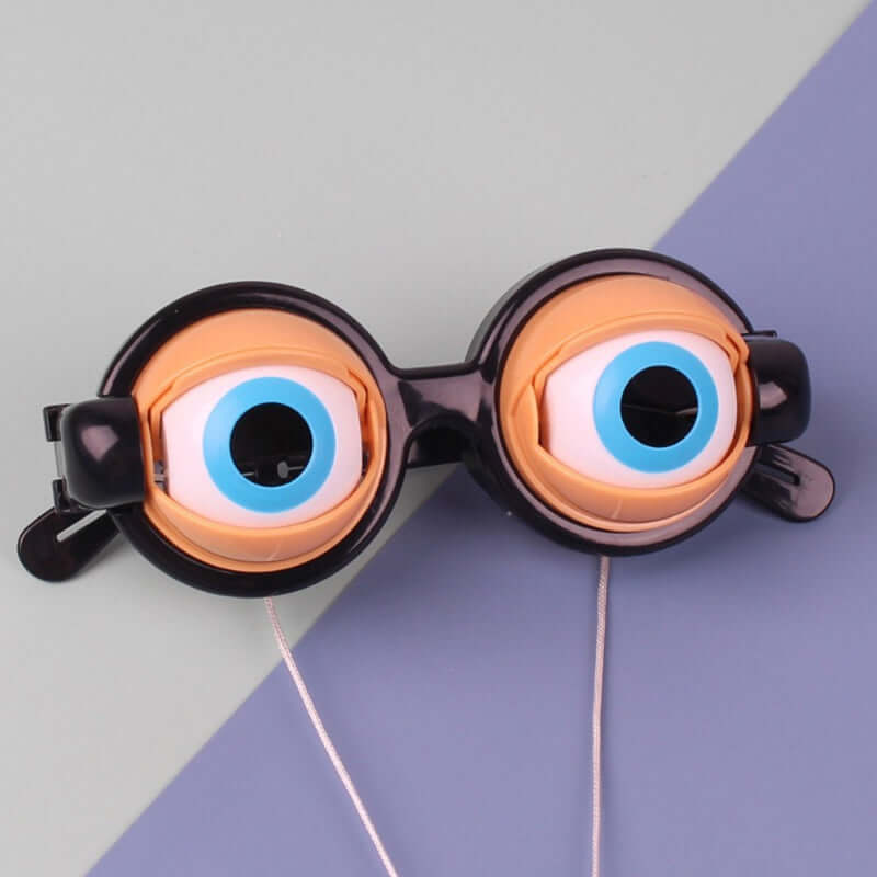 Crazy Eyes Novelty Glasses with blue eyes, fun party toy for pranks, rave events, and celebrations.