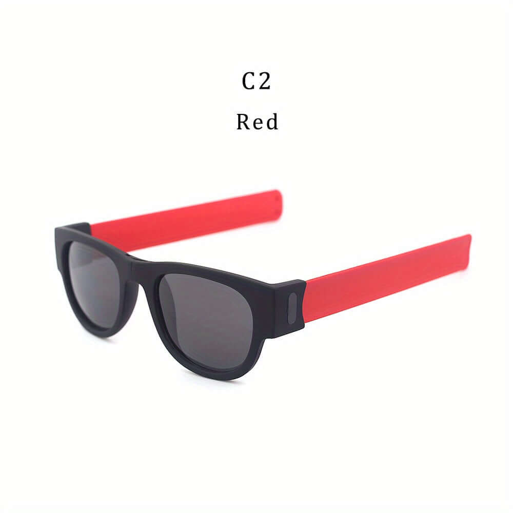 Foldable slap-on polarized sunglasses with red arms and black frame, sporty design, ideal for outdoor activities and travel.