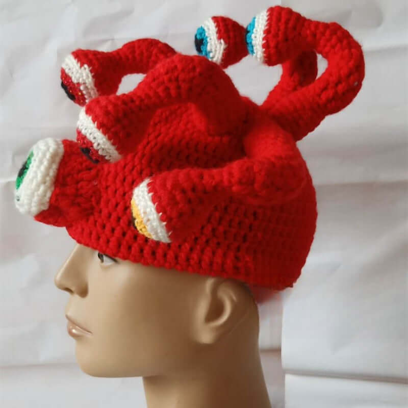 Funky Octopus Eye Monster Hat, red handmade knitted hat with octopus eye design, perfect for festivals and costumes.