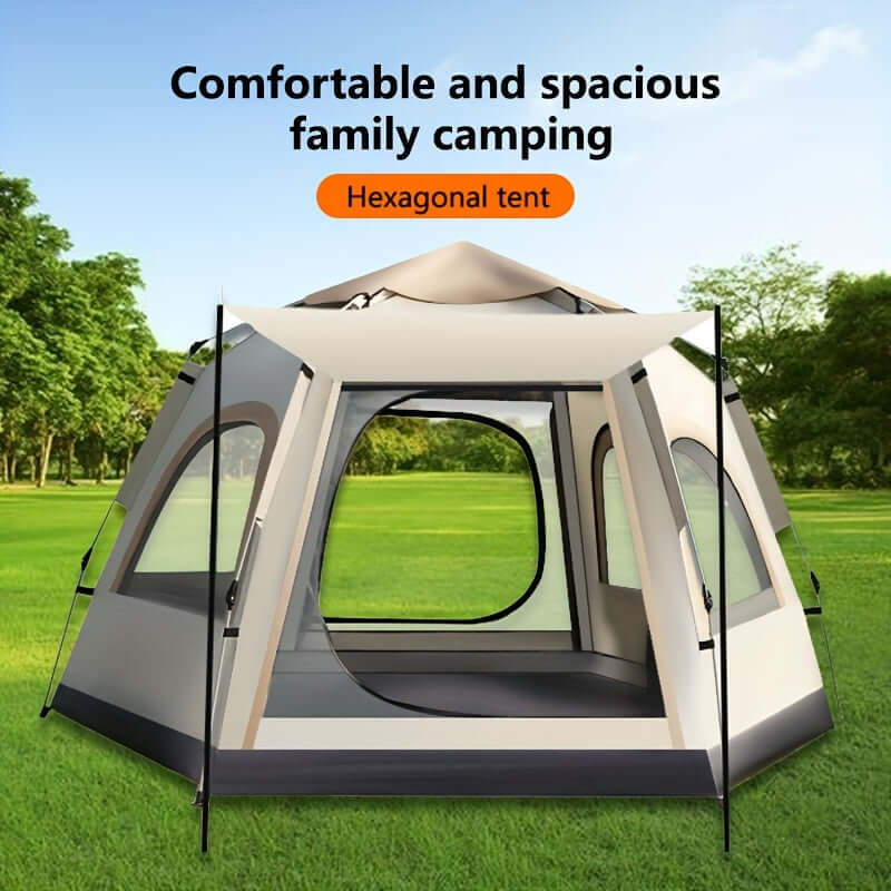 Hexagonal portable outdoor tent for 2-4 people, ideal for camping and hiking trips, shown set up in a grassy area.