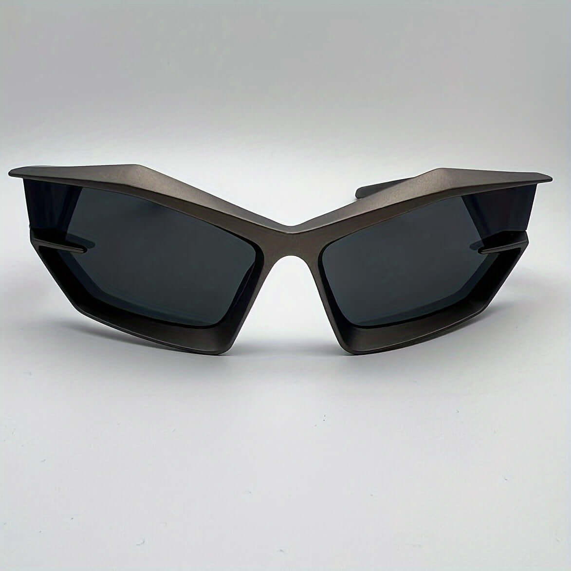 Modern polygonal rave glasses with anti-reflective lenses for outdoor climbing, hiking, and stylish sports activities.