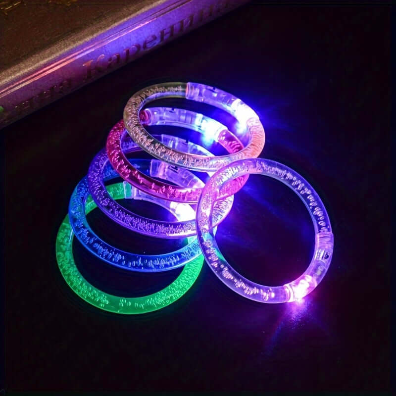 Colorful LED glow bracelets for parties, events, kids, and adults, flashing in vibrant shades and designed for fun occasions.