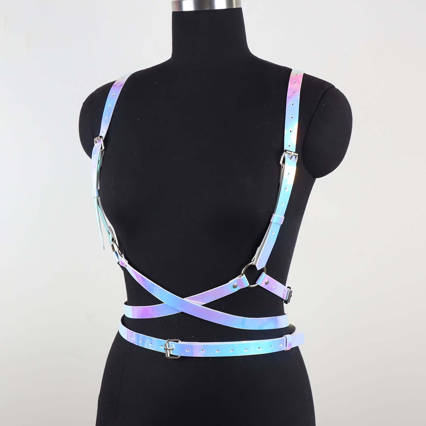 Rainbow gradient angel wing PU leather harness belt with rivets displayed on a mannequin, highlighting its street punk aesthetic.