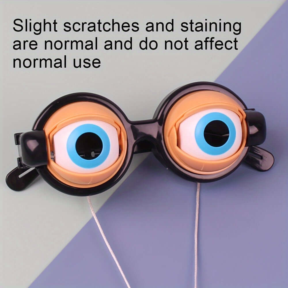 Crazy Eyes Novelty Glasses with quirky eyes design, perfect for parties and pranks, shown with slight scratches noted as normal.