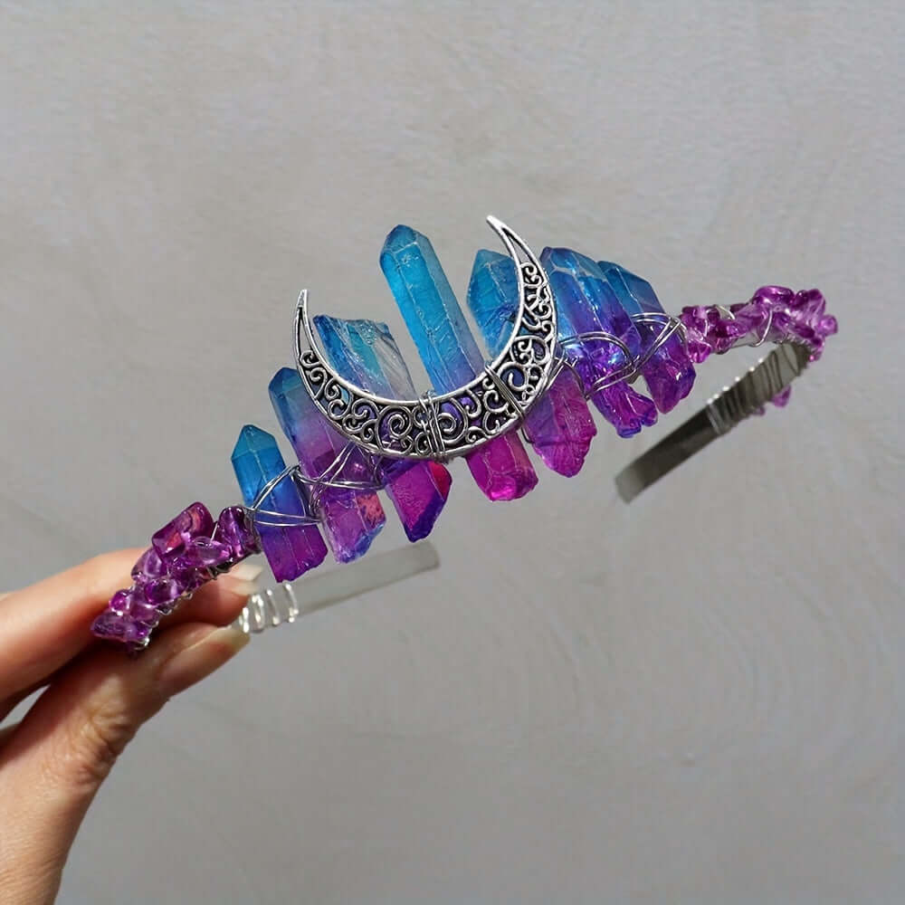 Elegant moon-shaped crystal headband in vibrant blue and purple, perfect for weddings and special occasions.