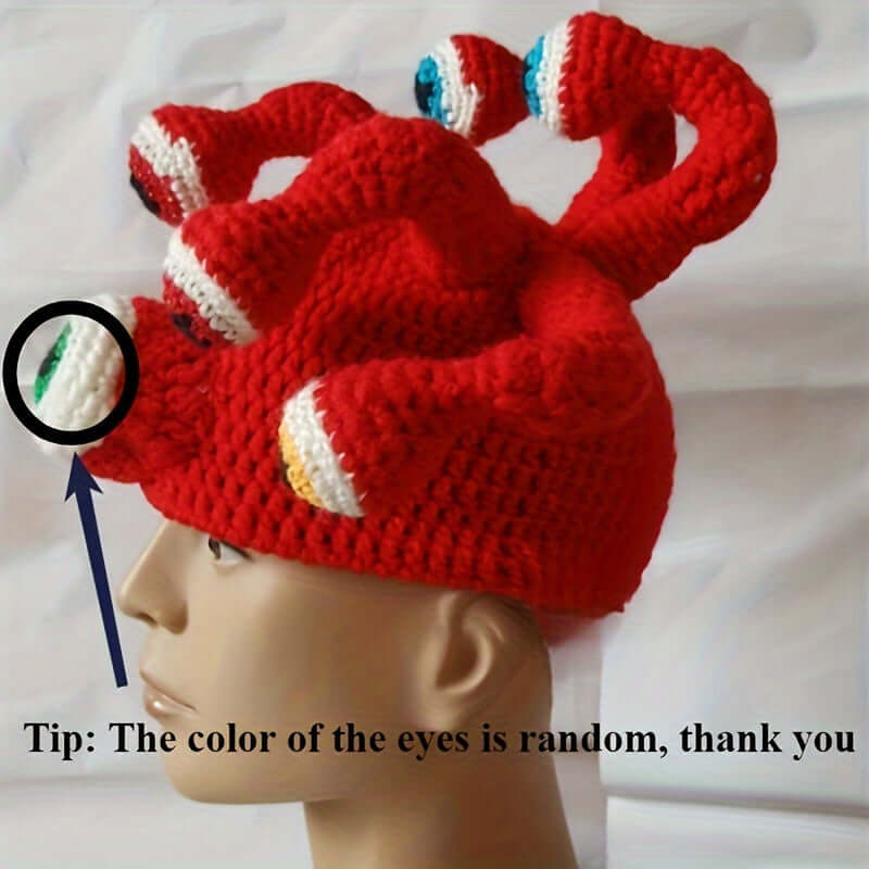 Handmade knitted hat with octopus eye design, in vibrant red, perfect for festivals, cosplay, and quirky costume wear.