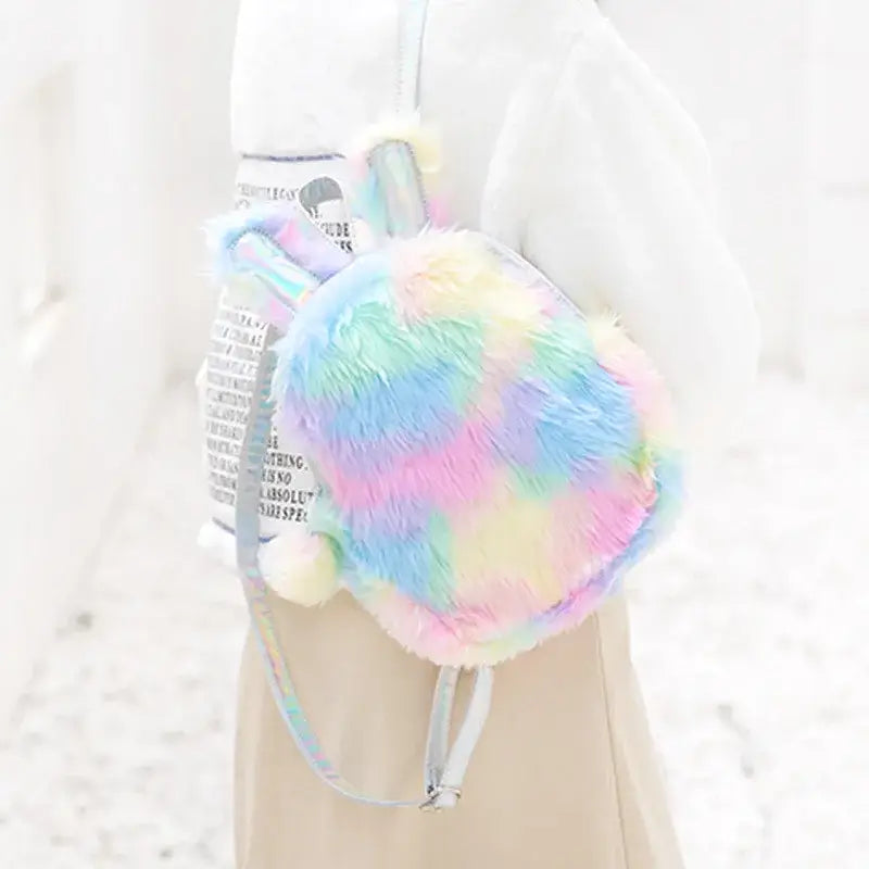 Kawaii unicorn rainbow mini backpack with plush holographic accents, perfect for festivals and parties.