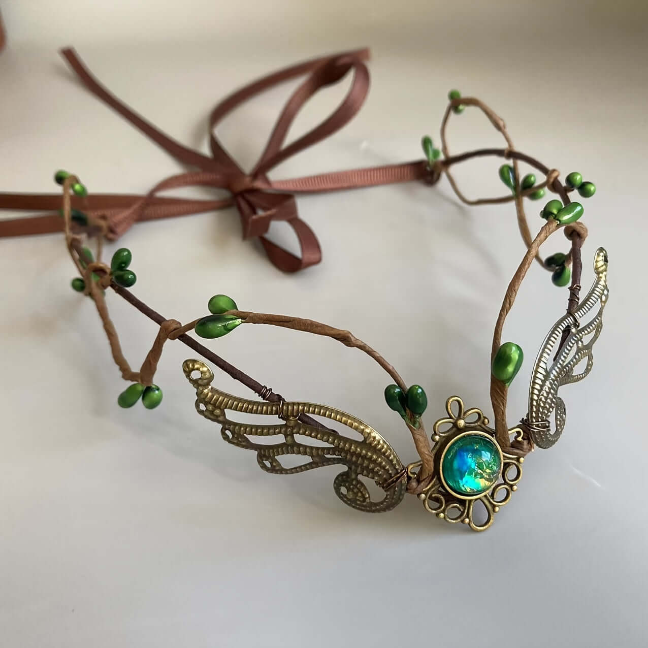 Handcrafted medieval witch headband with faux gemstones and elven design, perfect for cosplay and festivals.