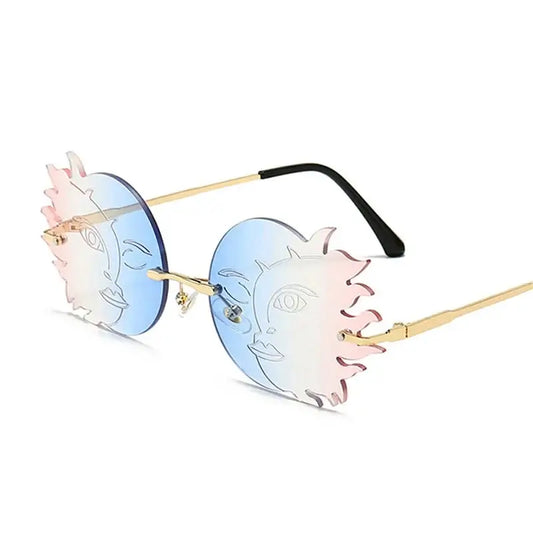 Rimless irregular round sunglasses with sunburst design, gradient lenses, and gold frames for a bold, vintage look.