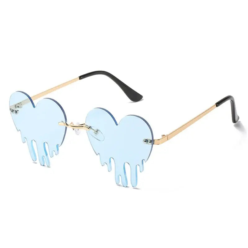 Rimless heart tear-shaped sunglasses in steampunk style with blue gradient lenses and UV400 protection.