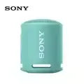 Sony XB13 EXTRA BASS portable Bluetooth speaker in turquoise, waterproof and dustproof design for outdoor adventures.