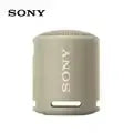 Sony XB13 EXTRA BASS portable Bluetooth speaker, IPX6 waterproof, beige design, compact and durable for outdoor use.