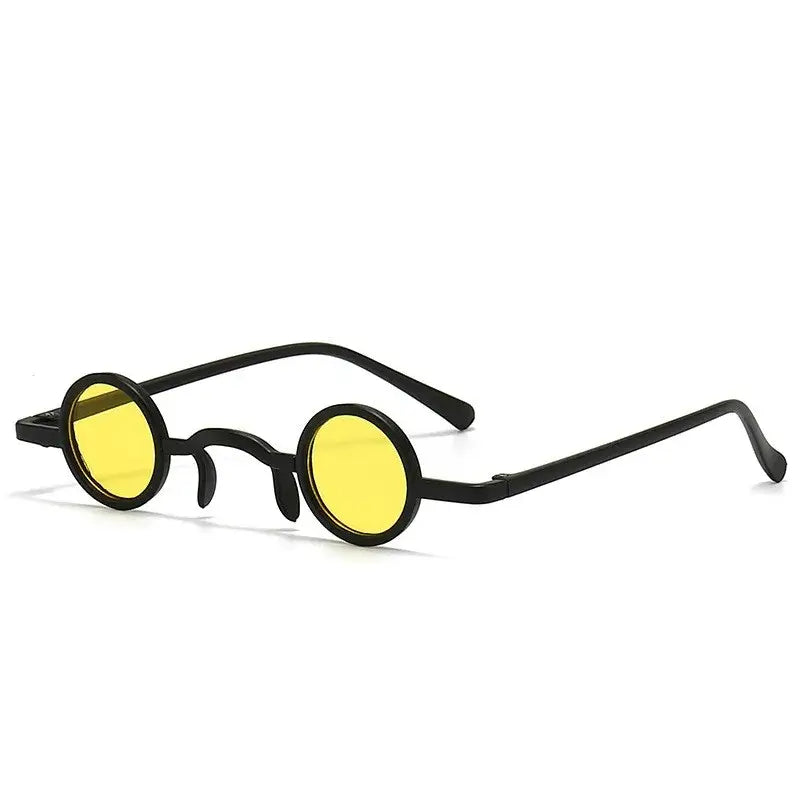 Vintage round sunglasses with yellow lenses and metal frame, unisex punk rock style eyewear for men and women.