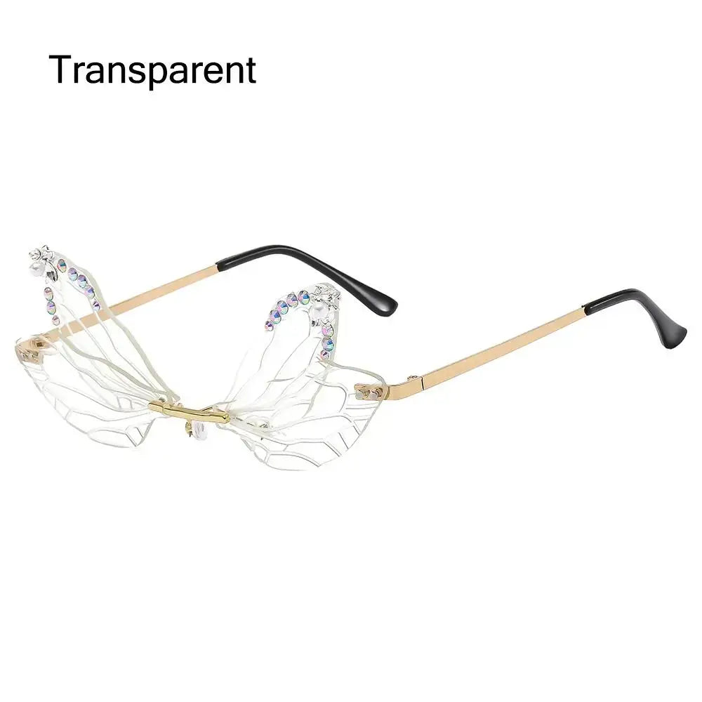 Transparent dragonfly wings sunglasses with diamond embellishments and irregular luxury frame design for stylish fashion occasions.