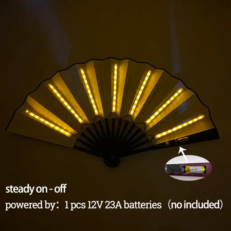 LED glow folding fan with vibrant yellow lights, battery-powered, perfect for stage performances and parties.