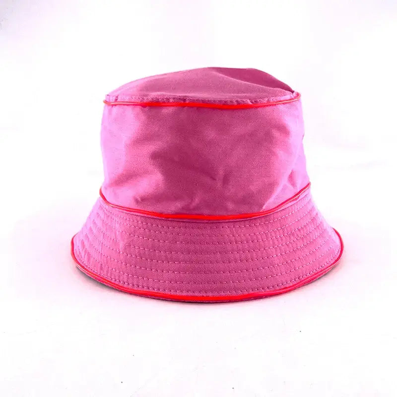 Pink LED glowing bucket hat with neon light, perfect for parties and beach outings, 13 colors available for stylish nighttime fun.