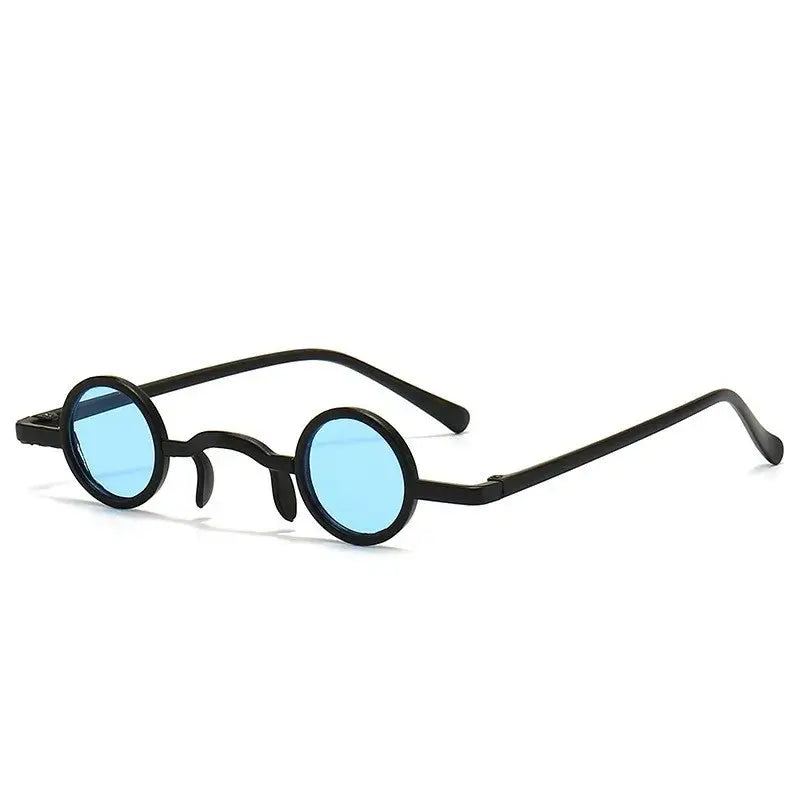 Vintage punk round sunglasses with small metal frame and blue lenses, ideal unisex eyewear for retro rock style.