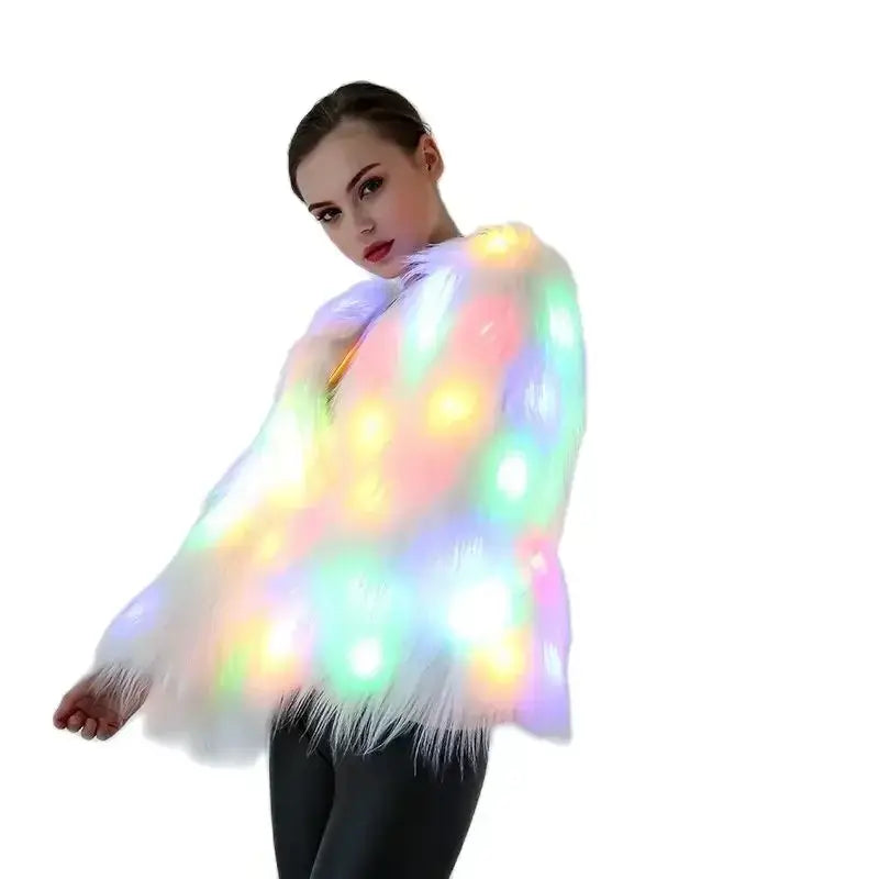 LED multi-color faux fur coat glowing brightly, perfect for raves and festivals, modeled by woman in stylish pose.