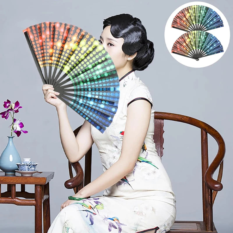 Woman holding a gradient reflective handheld fan, showcasing its vibrant colors and foldable design, ideal for festivals and dance events.