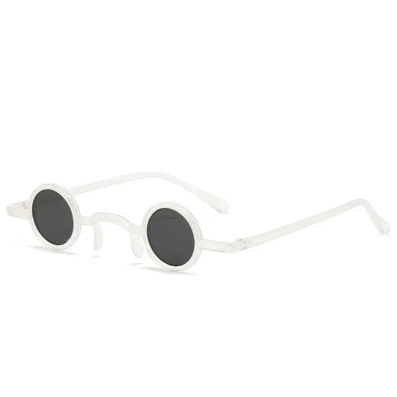 Vintage round punk sunglasses with small metal frame for men and women in white color option.