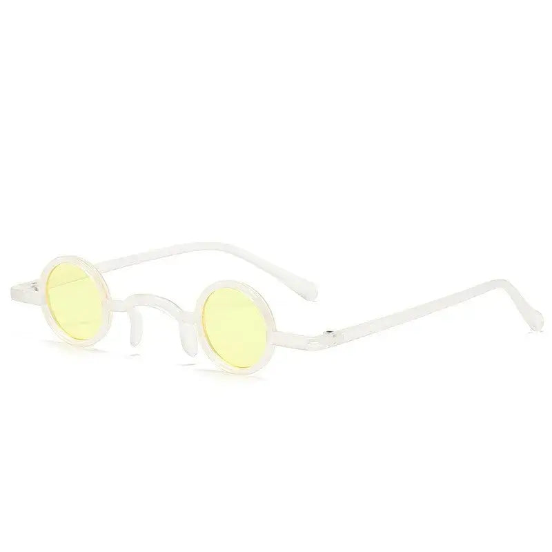 Vintage rock punk round sunglasses with small metal frame and yellow lenses for men and women.