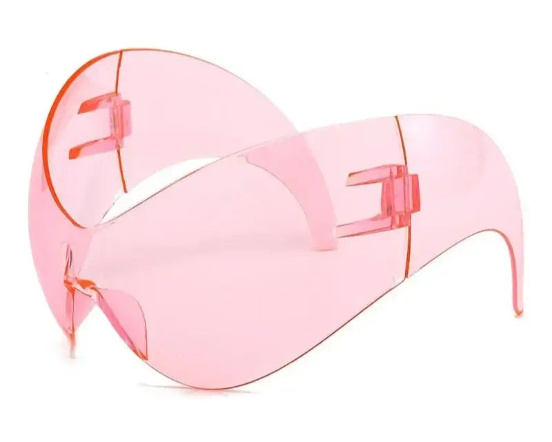 Y2K oversized pink wrap sunglasses with UV400 protection, perfect for festivals and raves, featuring a retro-futuristic shield design.