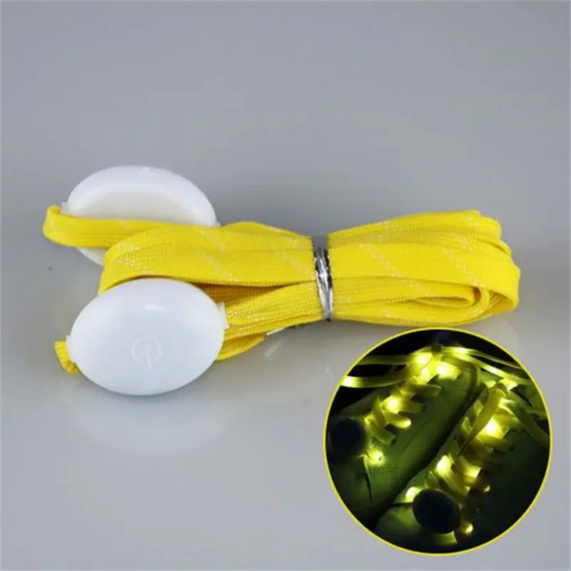 Yellow LED light-up shoelaces with glowing effect, featuring waterproof design and multiple color modes for shoes.