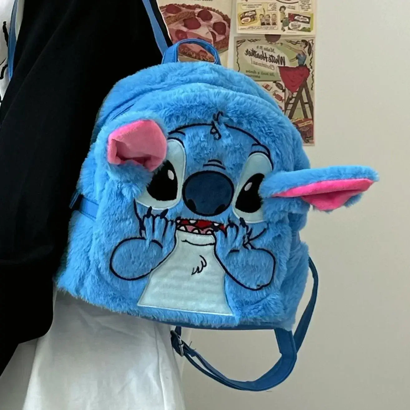 Cute blue cartoon Stitch mini backpack with ears, perfect for kids. Durable design for daily use and festivals.