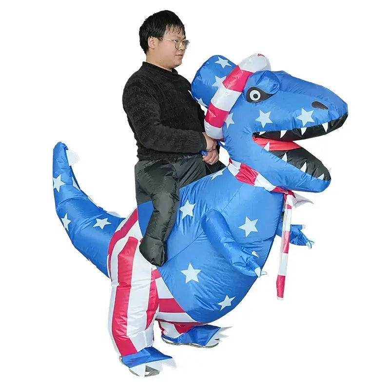 Adult wearing inflatable dinosaur costume with blue and red star design