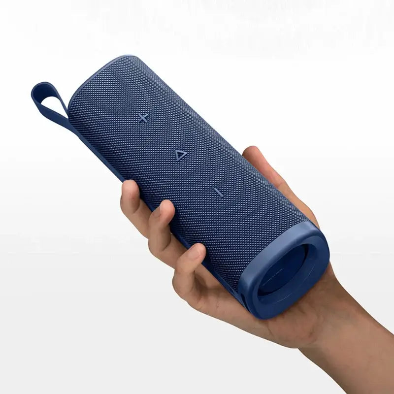 "Hand holding Xiaomi Sound Outdoor 30W Bluetooth Speaker with durable design"