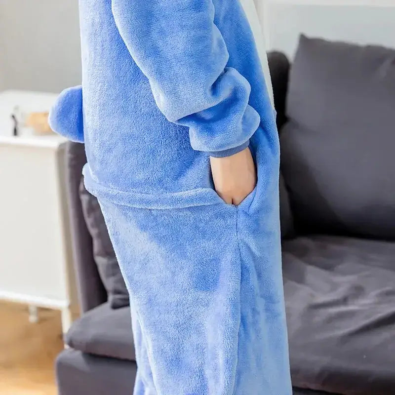 Cozy blue flannel onesie costume with pockets, designed for comfort and warmth, featuring a side view of the lower body.