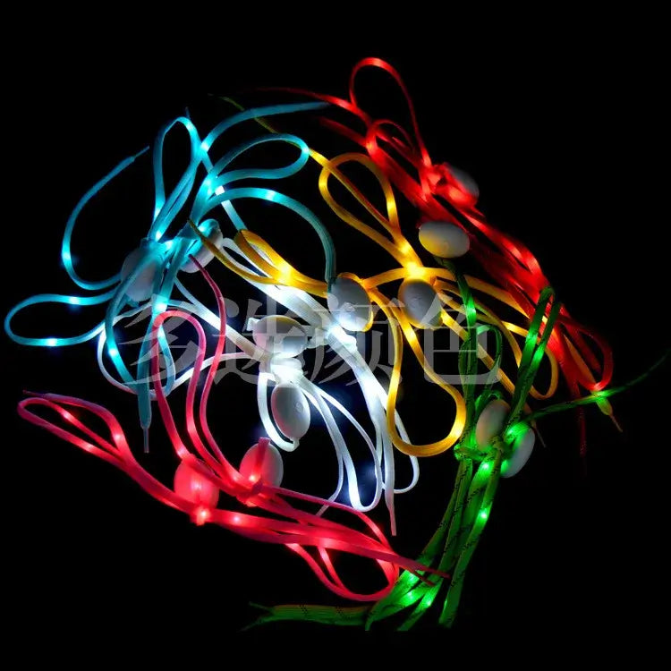 Vibrant LED shoelaces glowing in various colors against a dark background, perfect for adding fun to sneakers, boots, and skates.