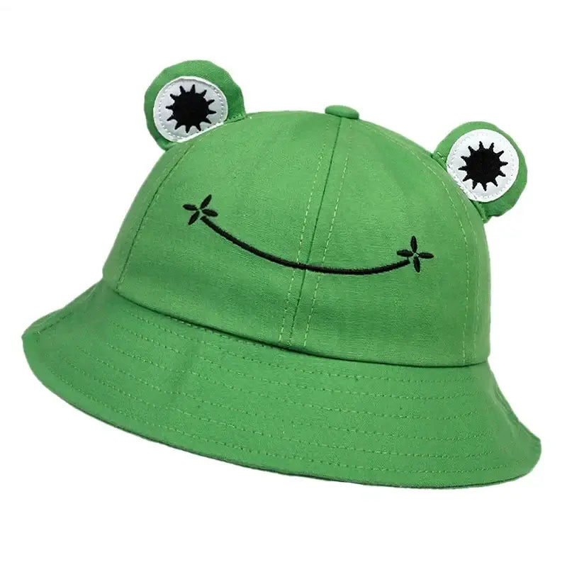 Cute frog-themed bucket hat with embroidered face and 3D eyes, offering sun protection for outdoor leisure activities.