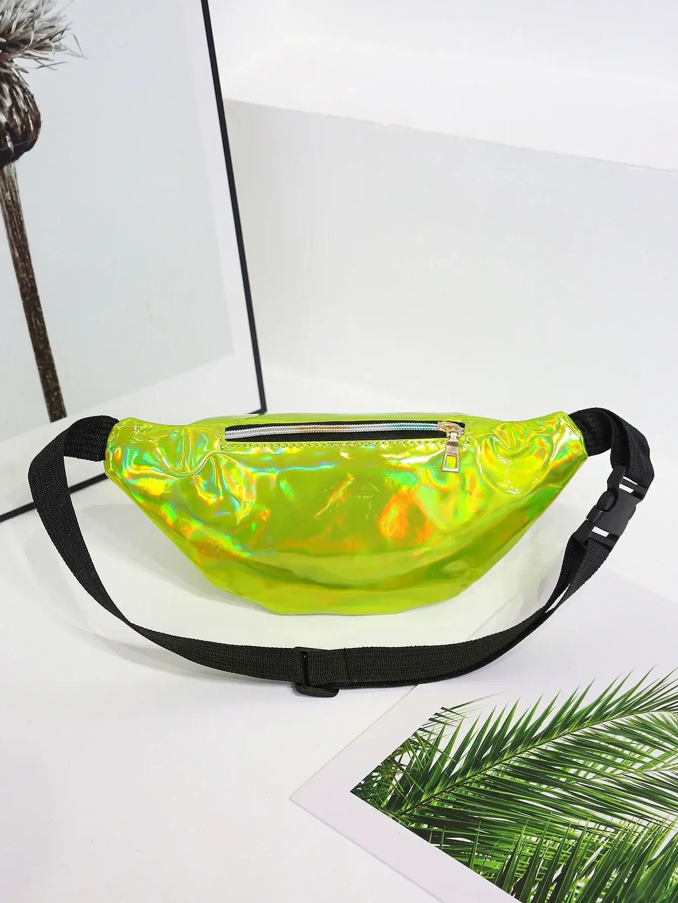 Holographic laser waist bag in neon green, versatile unisex design for festivals, travel, and daily use, durable PVC material.