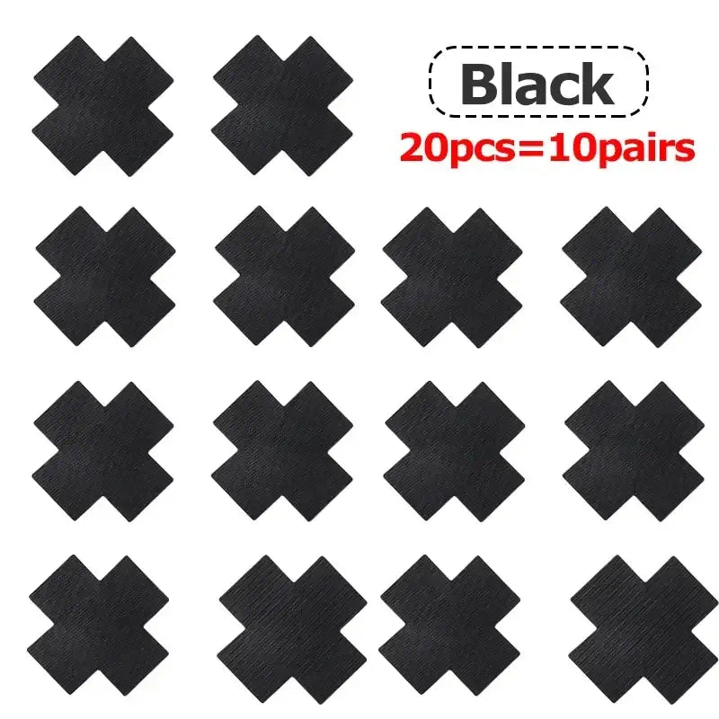 Black cross-shaped silk nipple covers, 20 pieces per pack, for invisible bra support and stylish outfit options.