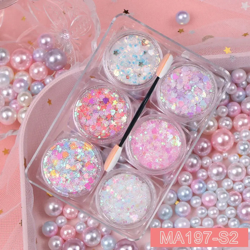 Glitter gel set with heart, star, and moon sequins for face, hair, and body makeup, perfect for festivals and parties.