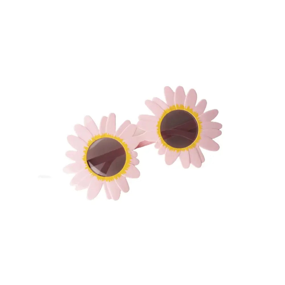 Pink sunflower-shaped sunglasses for festivals, combining style and UV protection in lightweight design.