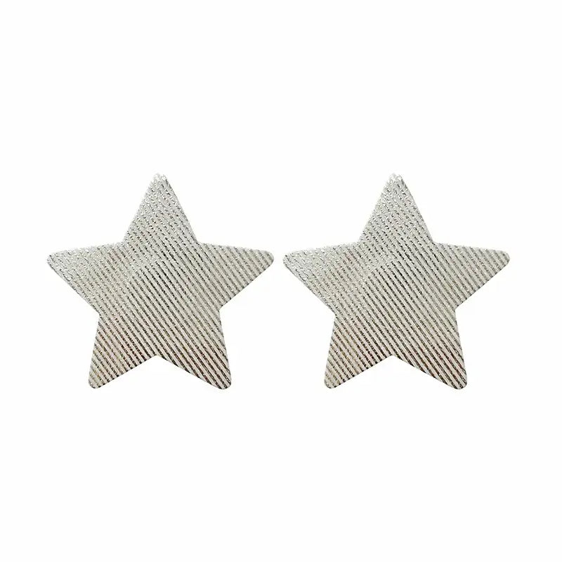 Ultra-thin star-shaped nipple covers with laser sequins, breathable and disposable, ideal for stylish coverage at parties and festivals.