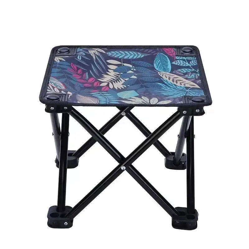 Portable folding stool with floral pattern, lightweight and compact for camping, fishing, beach trips, or garden use.