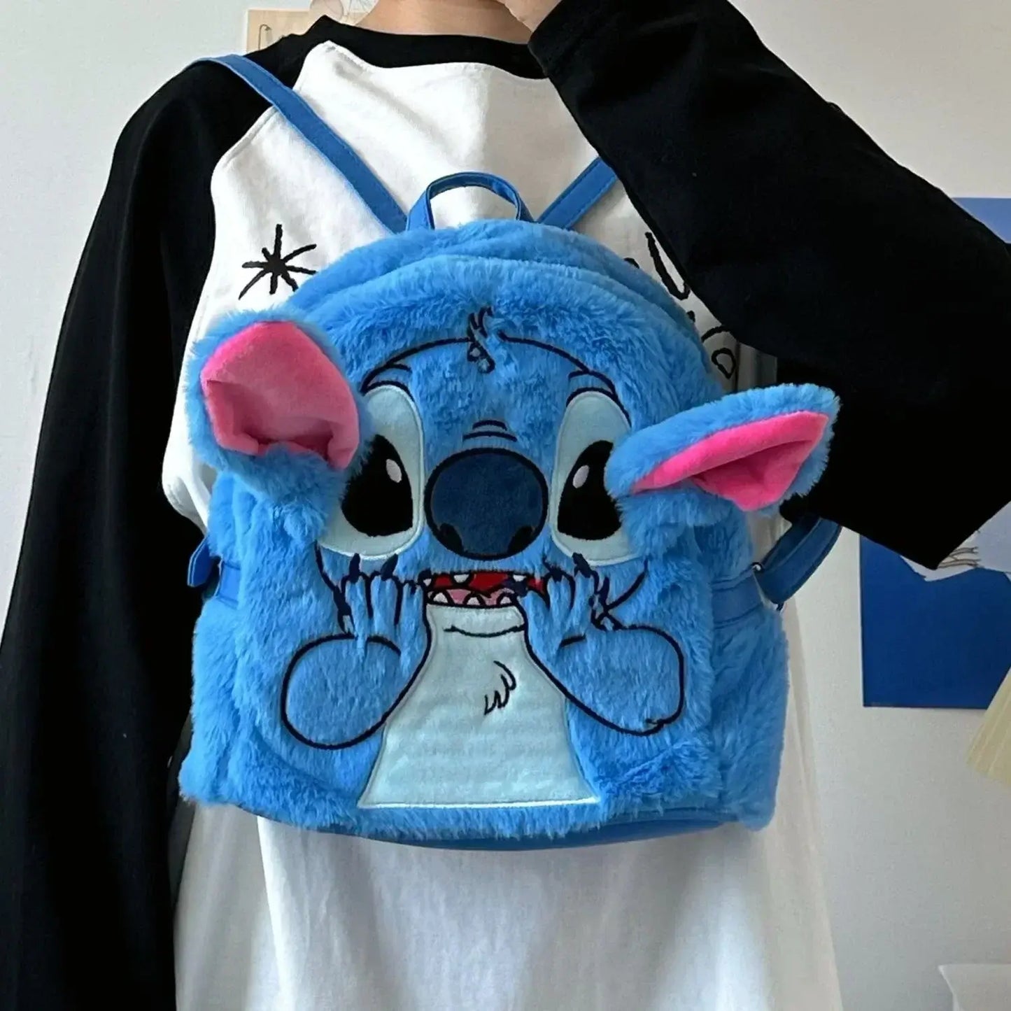 Cartoon Stitch kids mini backpack with soft handle and zip closure, perfect for festivals and daily use, shown in bright blue color.