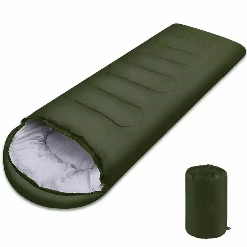 Ultralight 4-season waterproof camping sleeping bag, green envelope shape, compact design for outdoor hiking and travel.