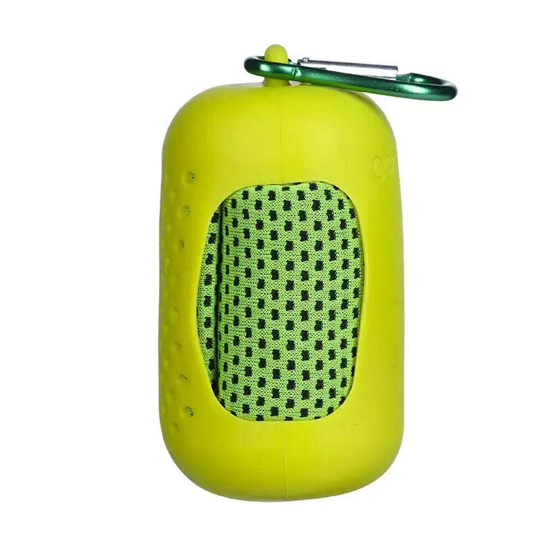 Portable green microfiber cooling sports towel in compact case with carabiner attachment.