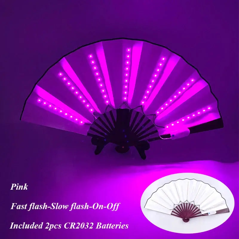 LED glow folding fan in pink with vibrant light effects, perfect for dance and stage performances, includes batteries for convenience.