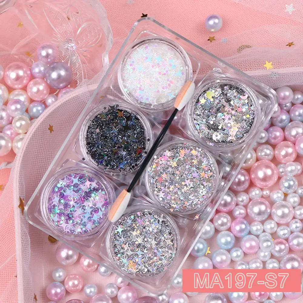 Glitter gel set with heart, star, and moon sequins for festival makeup; includes 6 jars on pink pearl background, code MA197-S7.