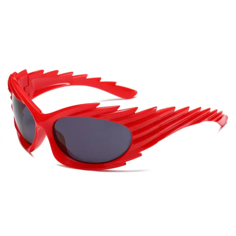 Red Y2K punk one-piece rave sunglasses with rimless design and sporty look for men and women.